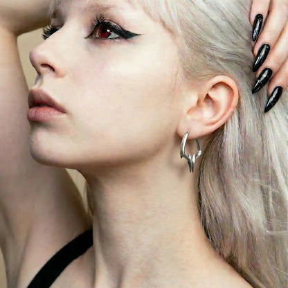 TWIN FANG EARRINGS