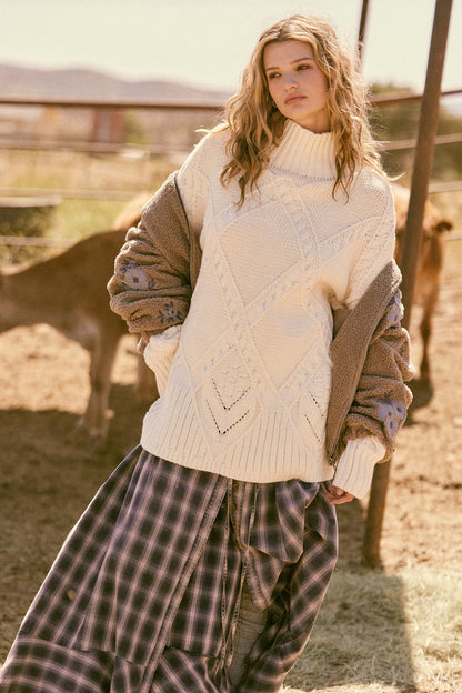 Twist Ending Oversize Cable Knit Mock-Neck Sweater