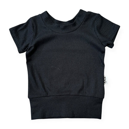 Black ribbed baby sweater with short sleeves on a white background